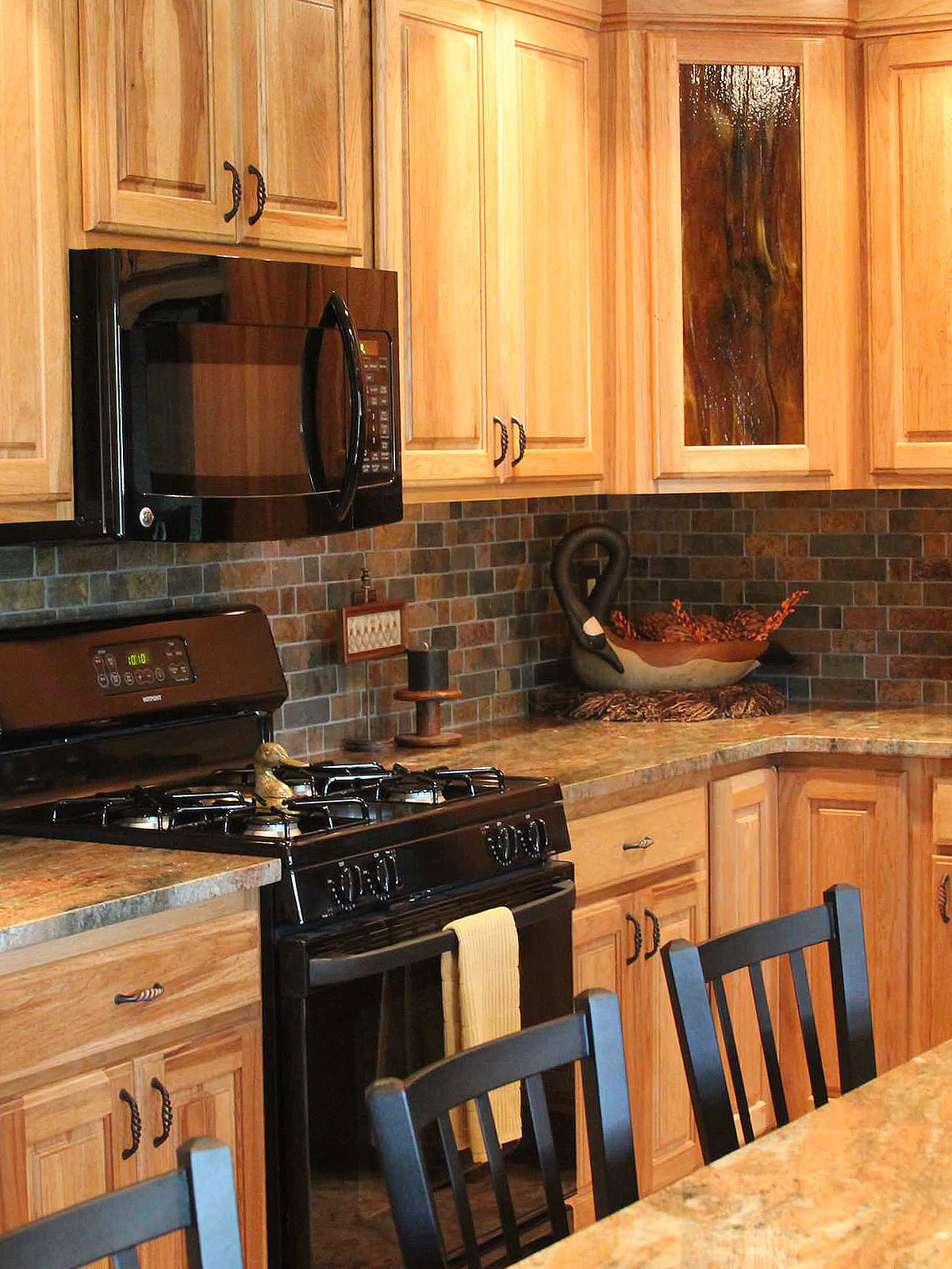 Oak kitchen cabinets rustic brown gray mosaic tile madura gold granite countertop BA1063
