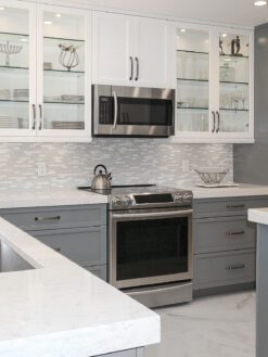 gray and white kitchen cabinets white backsplash