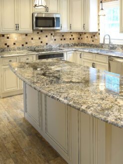 Beige cabinets granite countertop travertine glass backsplash tile 4 BA1043