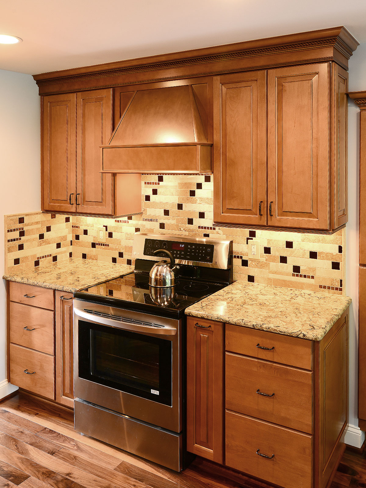 Brown cabinets quartz countertop travertine backsplash tile 2 BA1025