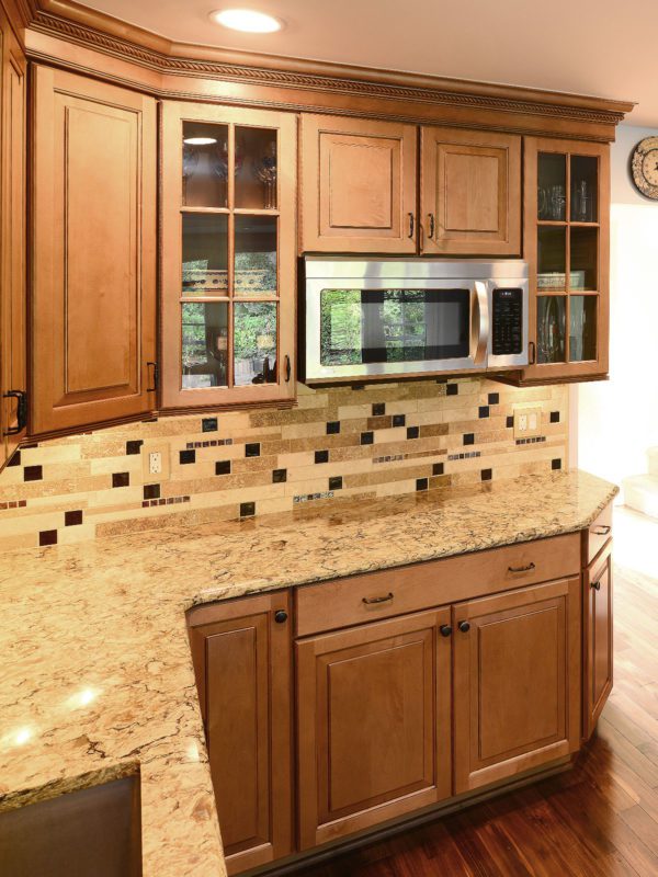 Brown cabinets quartz countertop travertine backsplash tile 4 BA1025