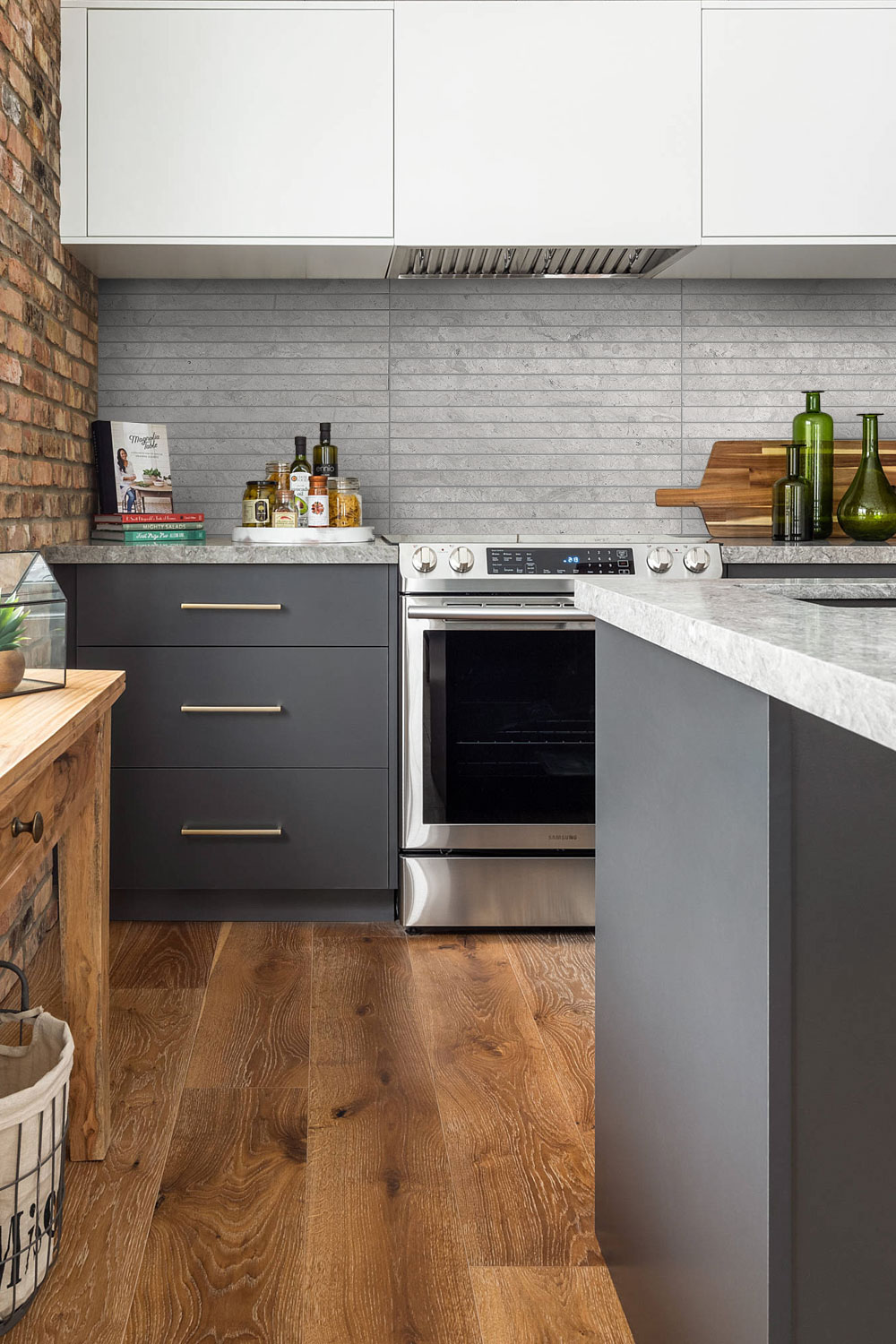 Industrial Kitchen Gray Cabinet And Limestone Backsplash Tile