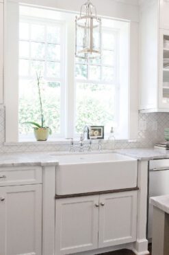 Arabesque White Backsplash Tile White Cabinets And Countertop